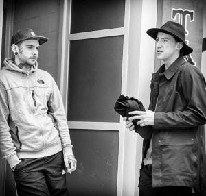 Street photography of two men.