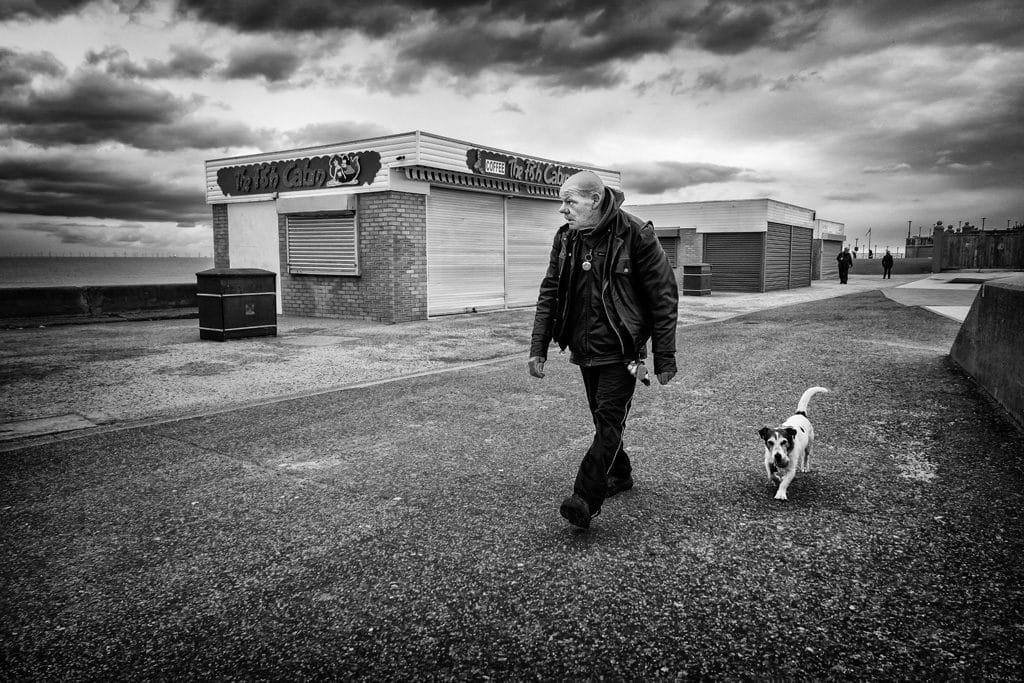 Man and Jack Russell Rhyl seafront